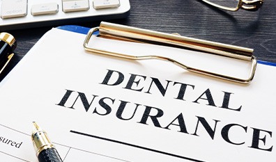 dental insurance form on table